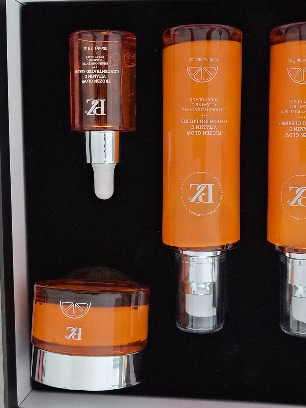 Bright Orange Skincare Set with Silver Accents